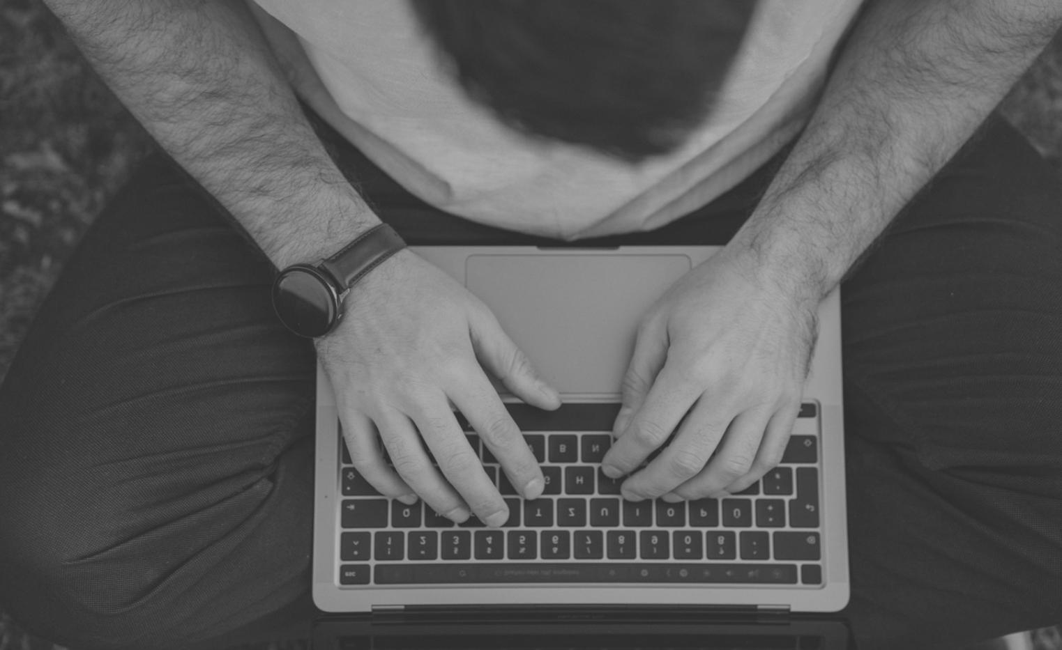 Team members working together on financial forecasting and budget planning documentation